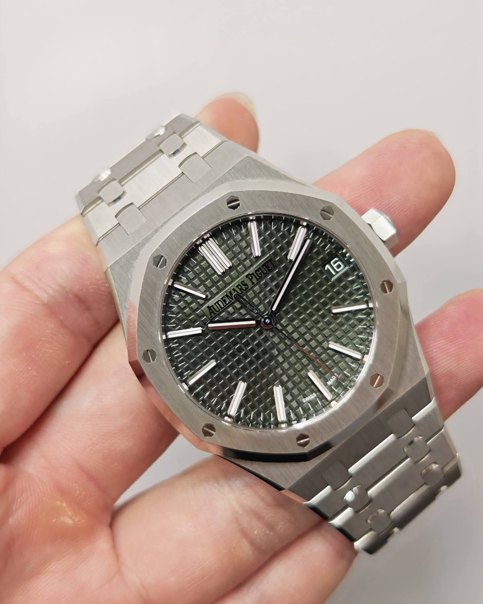 May be an image of wrist watch and text