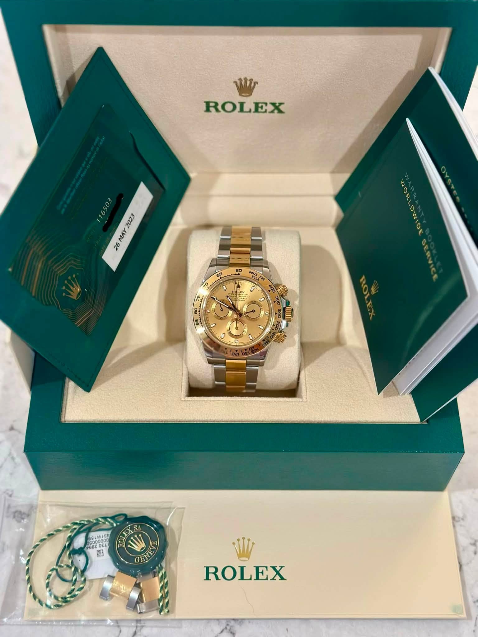 May be an image of wrist watch and text that says 'Wir ROLEX 2023 MAY 26 0 SLMAST T 정 OBO ROLEX'