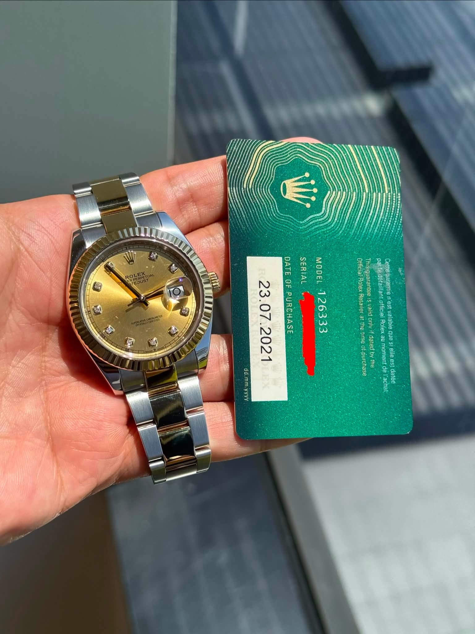 May be an image of wrist watch and text
