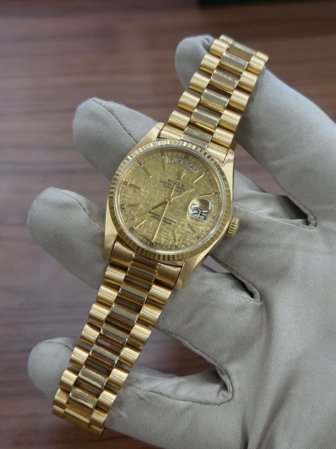 May be an image of wrist watch and text