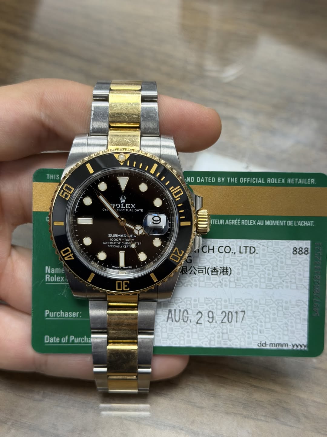 May be an image of wrist watch and text that says '1 THIS 50 C ND DATED BY THE OFFICIAL ROLEX RETAILER 10 ا ROLEX LE EX 20 RPETUALDAT JALDATE 9 SUBM SUBMARIN RINE MARIN ERLATINE…