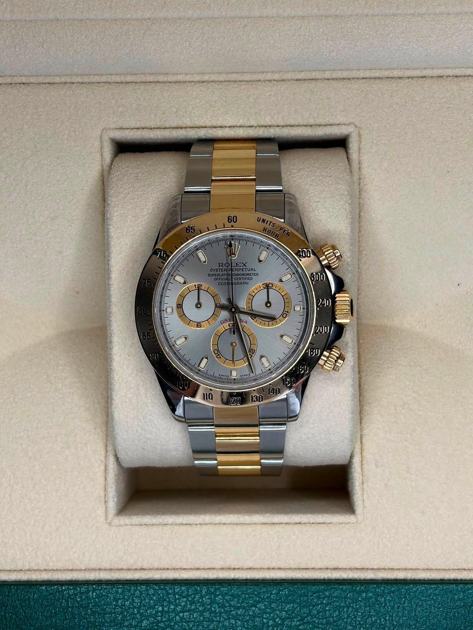 May be an image of wrist watch and text