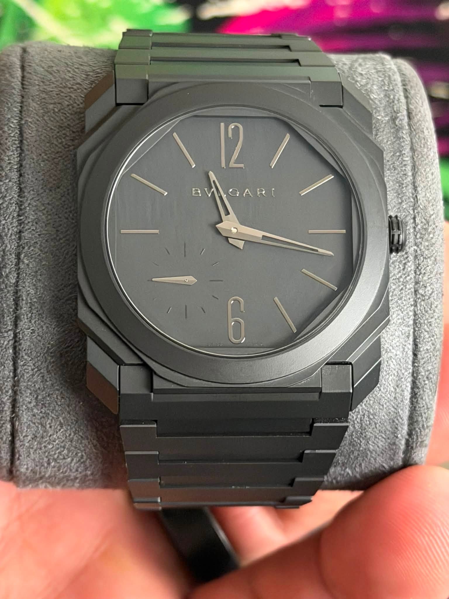 May be an image of wrist watch and text