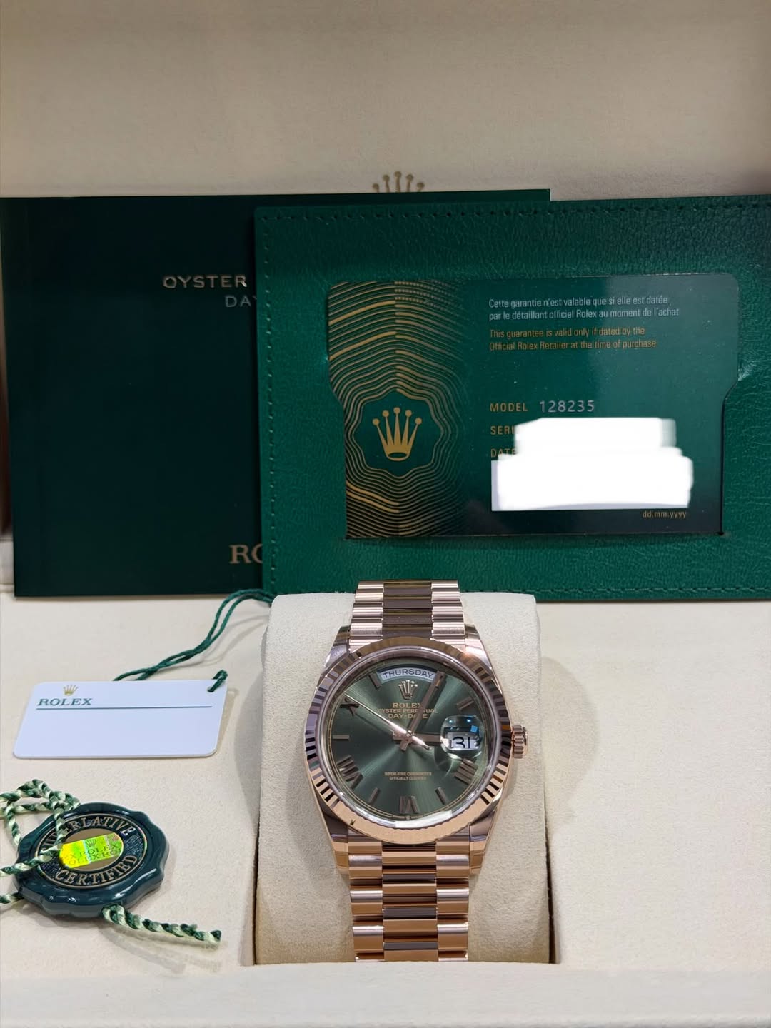 May be an image of wrist watch and text