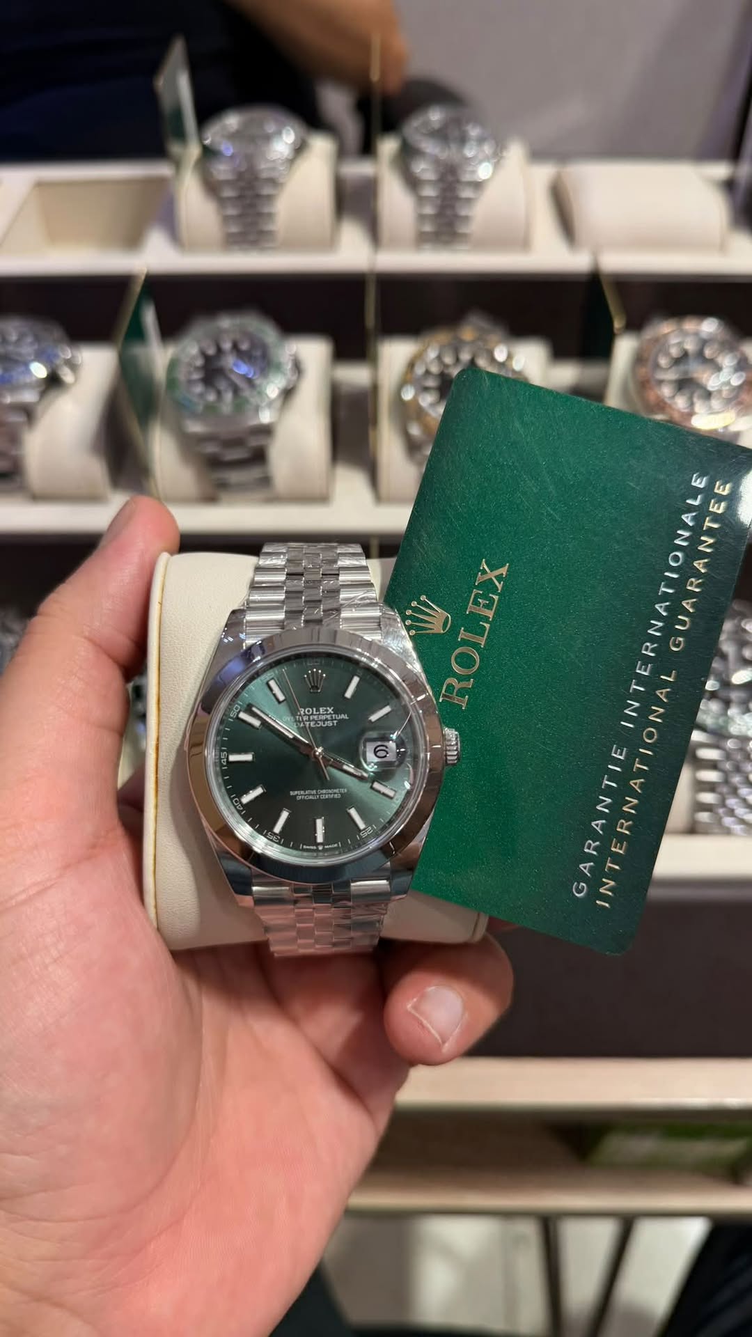 May be an image of wrist watch and text