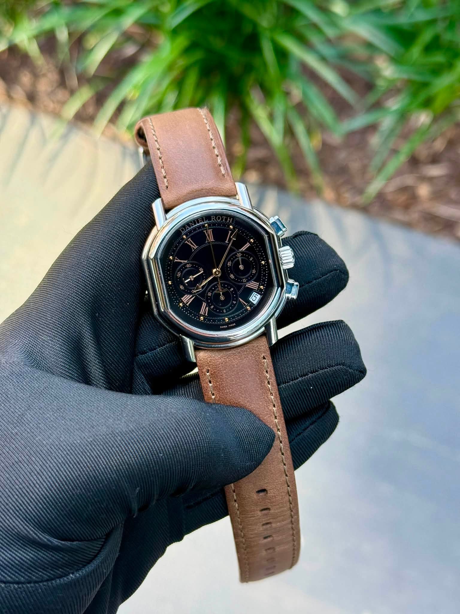 May be an image of wrist watch and leather
