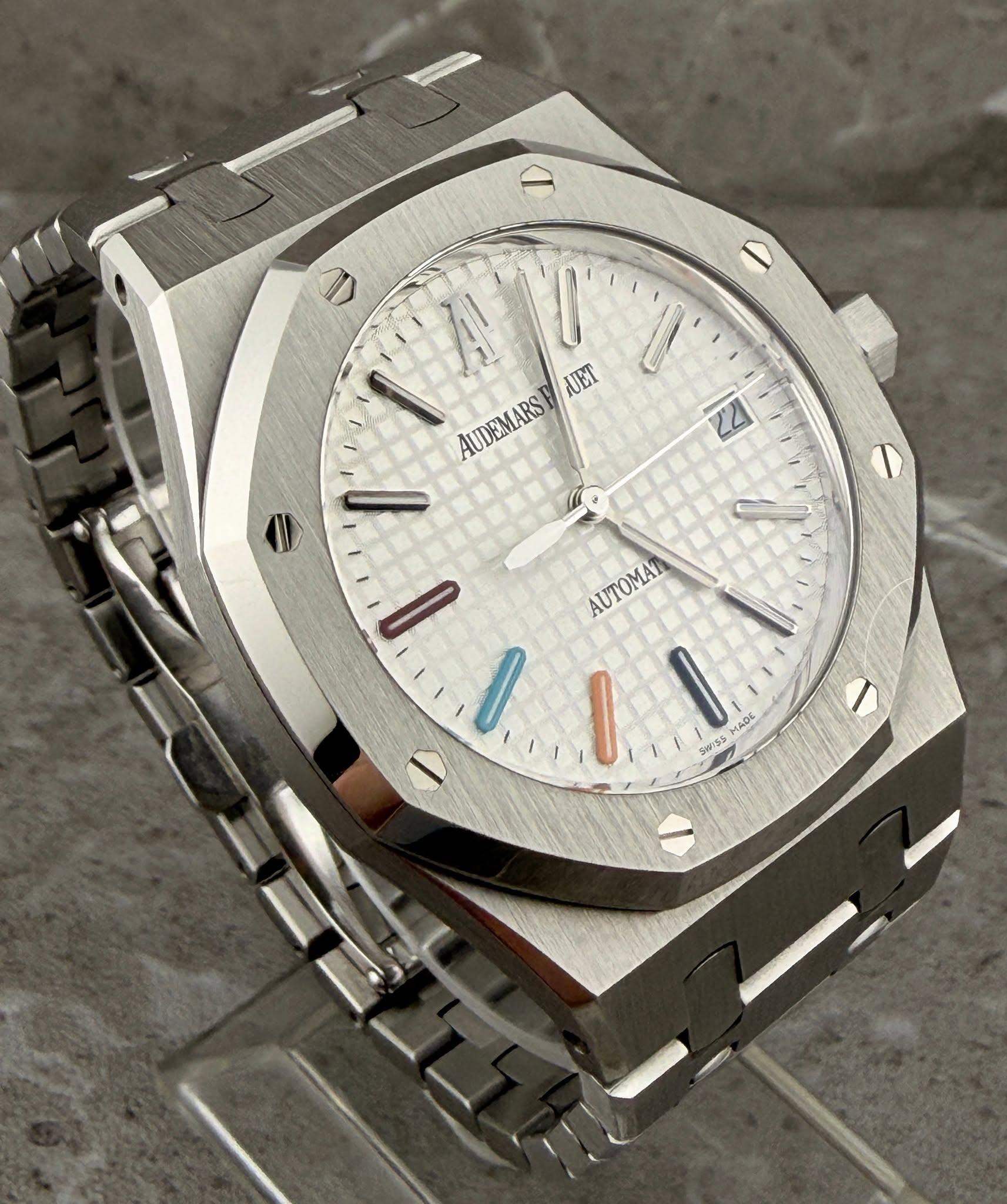 May be an image of wrist watch and text