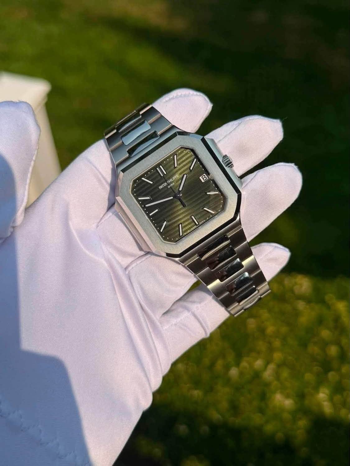 May be an image of wrist watch and text