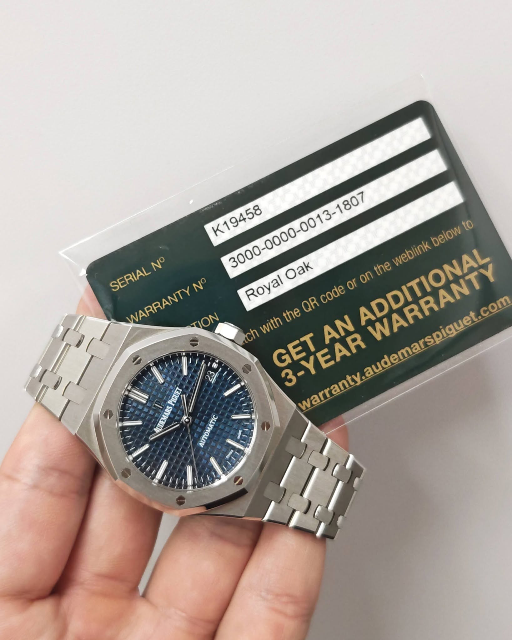 May be an image of wrist watch and text that says 'K19458 on the weblink below to SERIALN° N° SERIAL WARRANTYN N° Oak WARRANTY TION Royal the QR code or with ADDITIONAL ch GET…