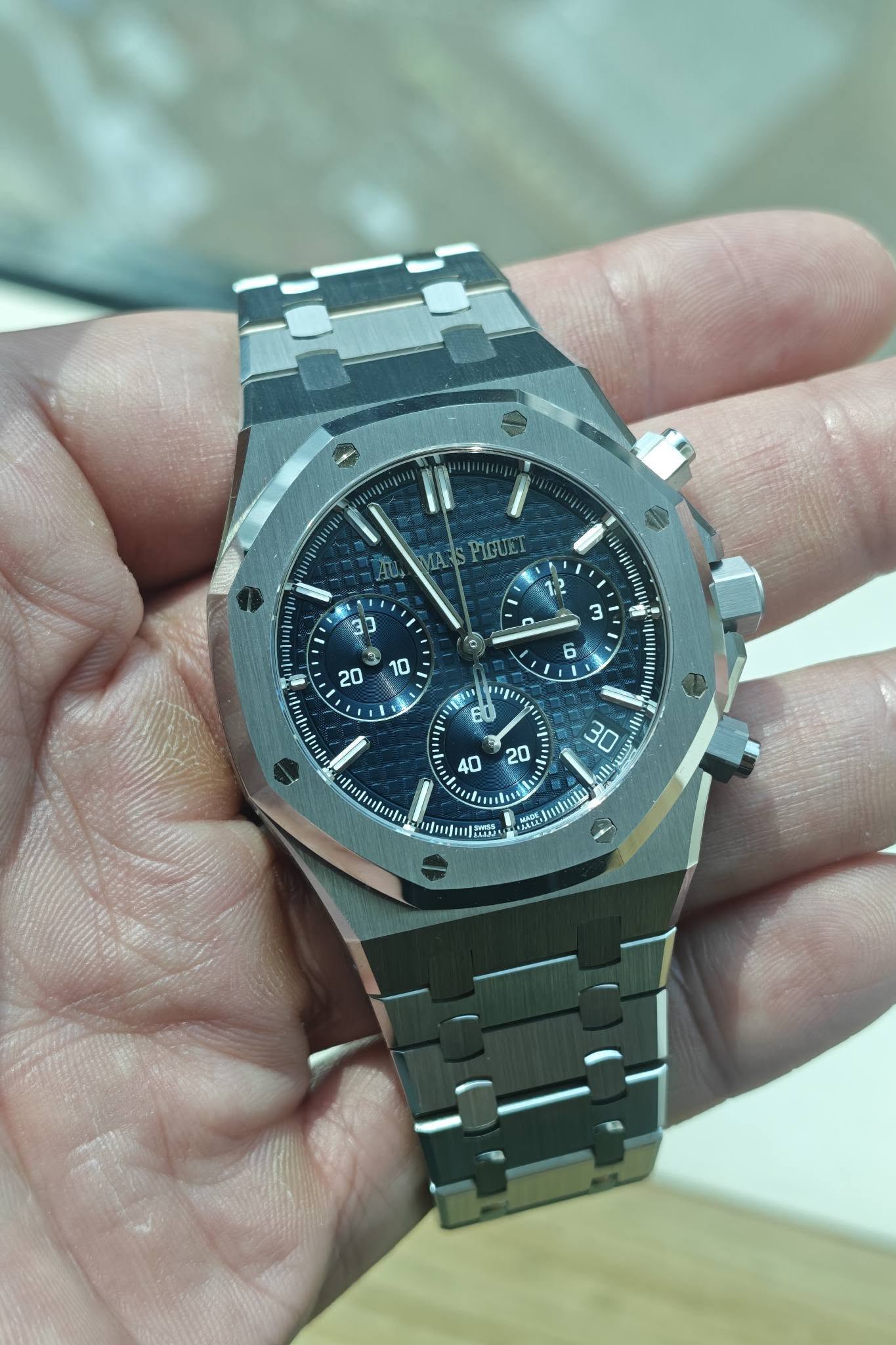 May be an image of wrist watch and text