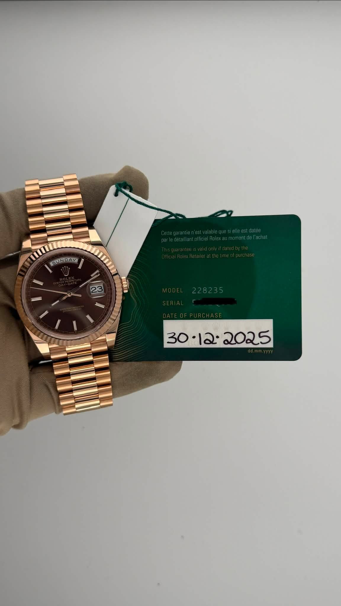 May be an image of wrist watch and text