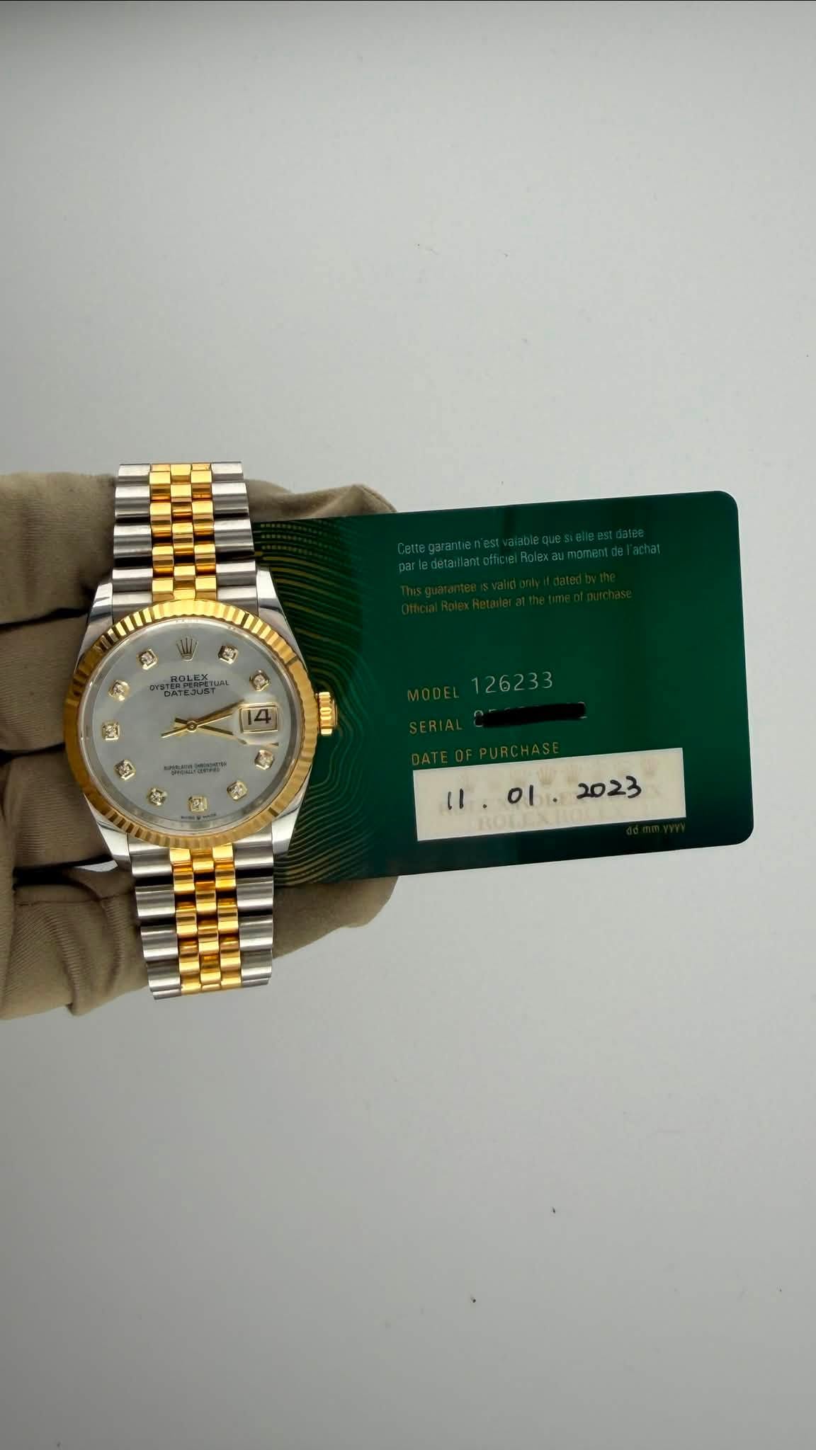 May be an image of wrist watch and text that says 'BEORI οι 2023'