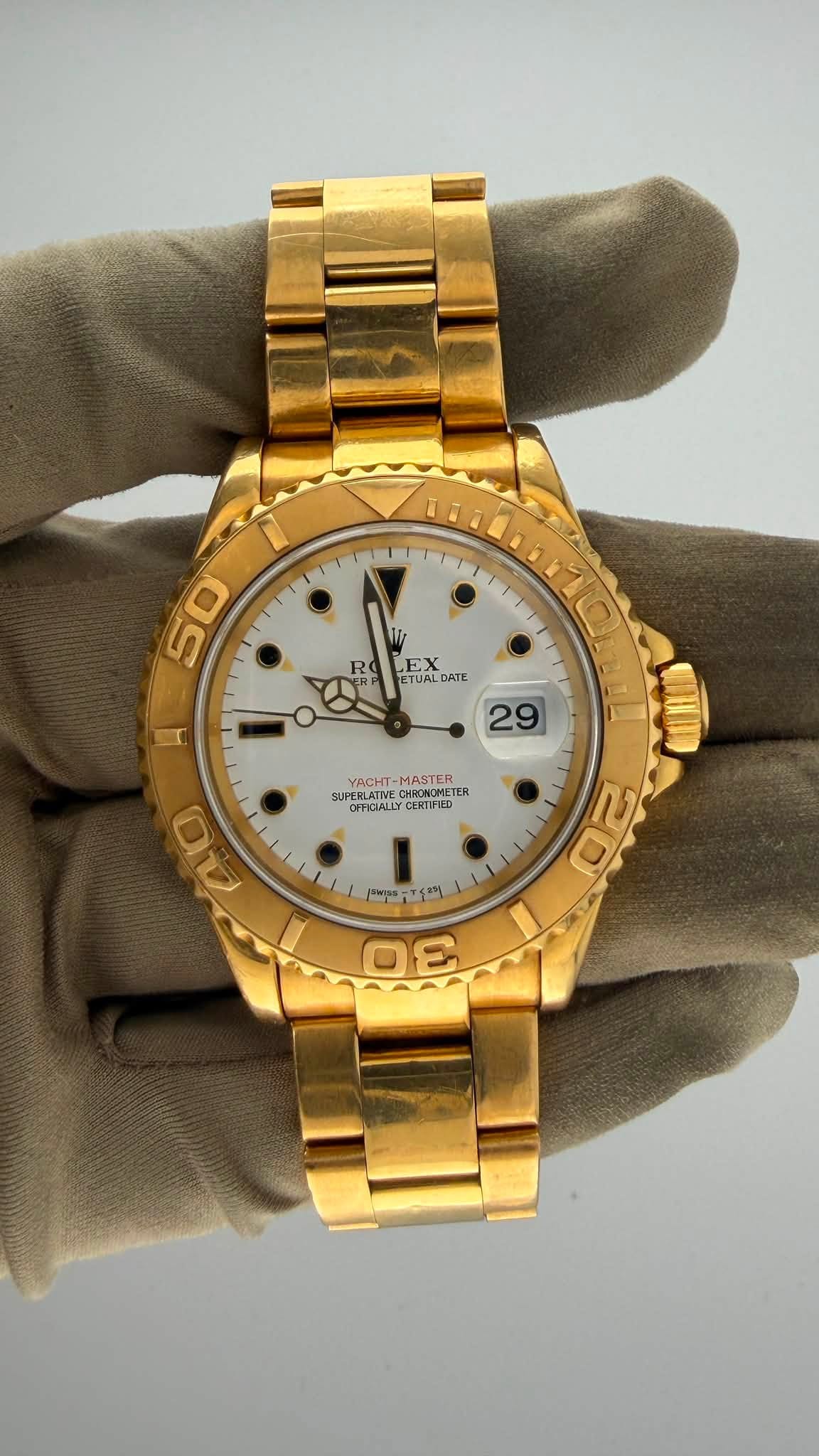 May be an image of wrist watch and text