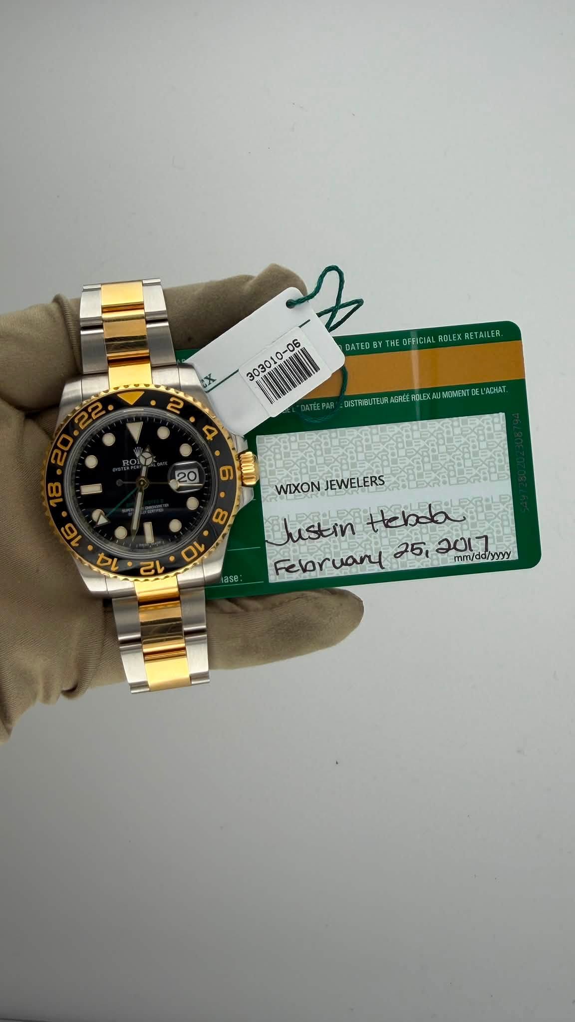 May be an image of wrist watch and text