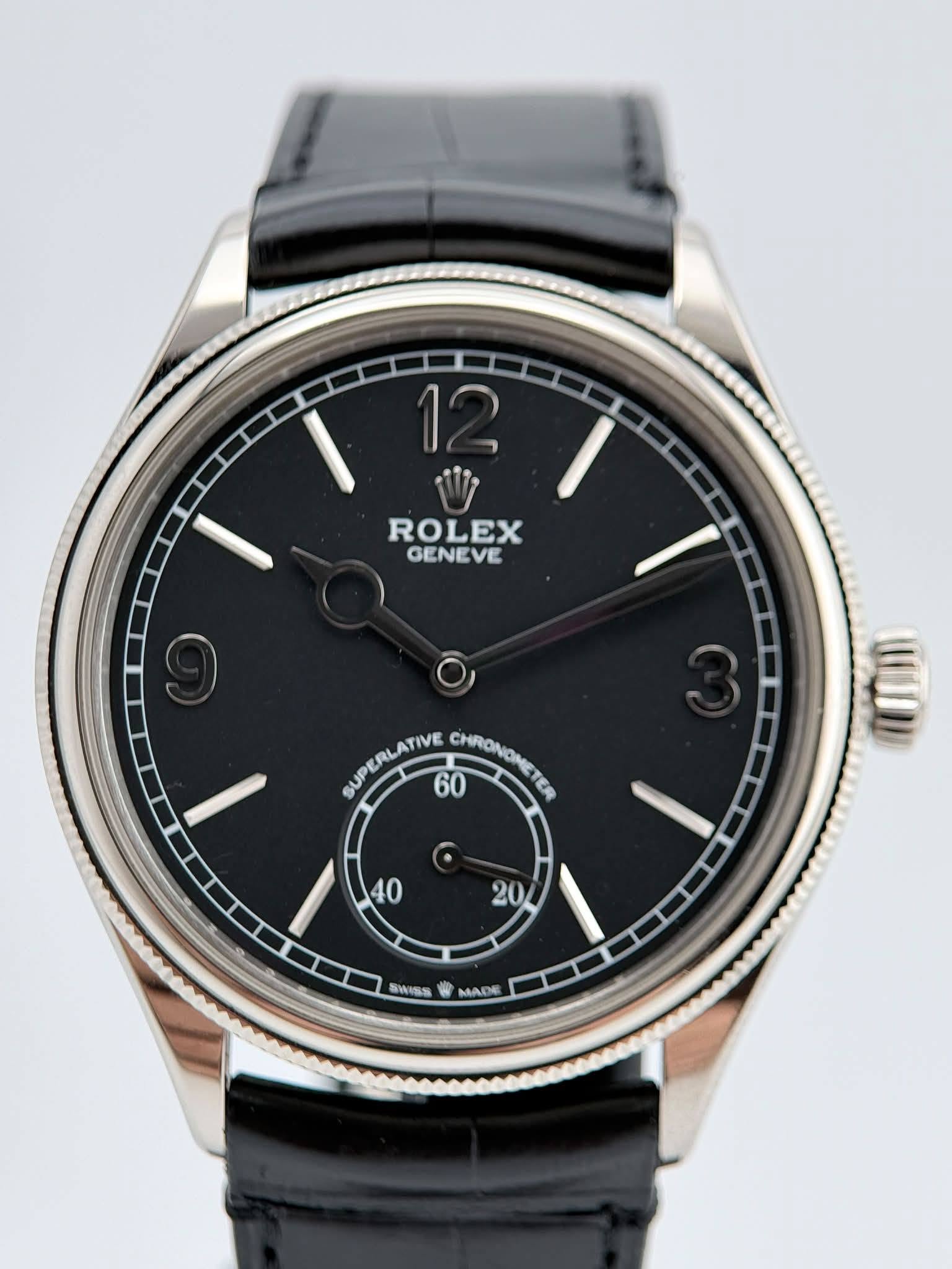May be an image of wrist watch and text that says '12 ROLEX GENEVE SUPERLATIVE ByPEЛιA.TИE 60 CHRONOMETER TER CHRONONET ወጣሀ 40 20/ W極 MADE'