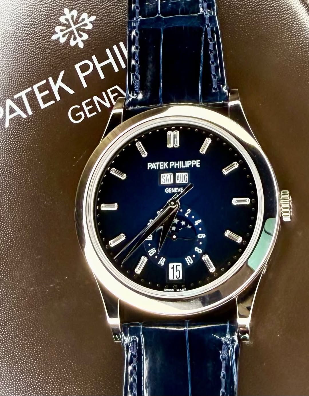 May be an image of wrist watch and text