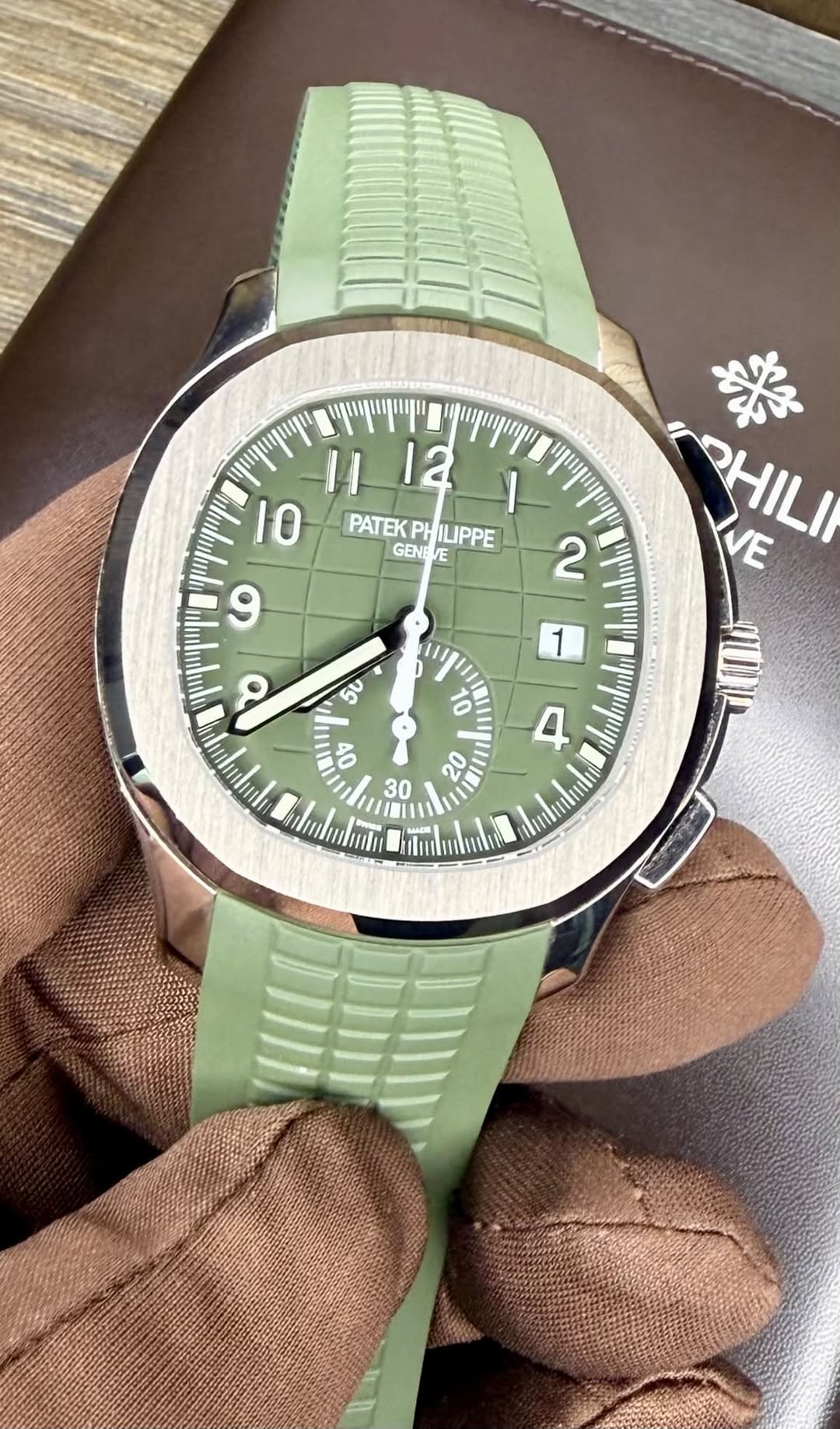 May be an image of wrist watch and text