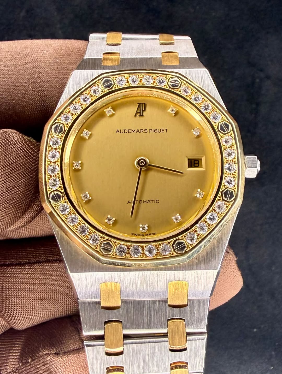 May be an image of wrist watch and text