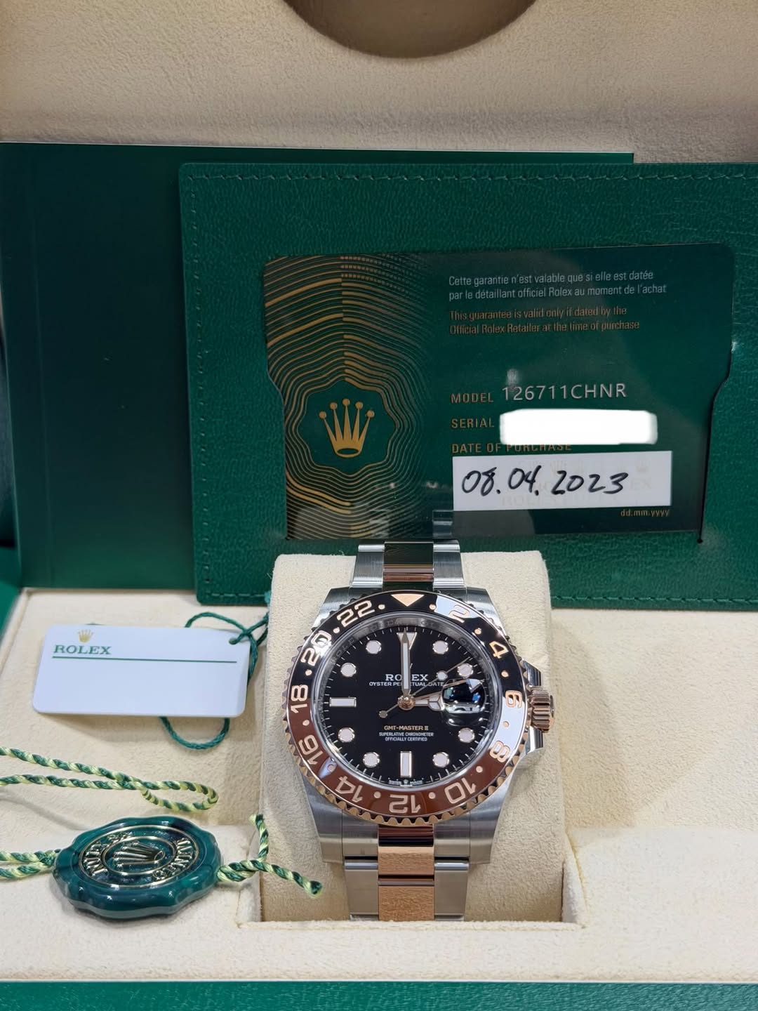 May be an image of wrist watch and text