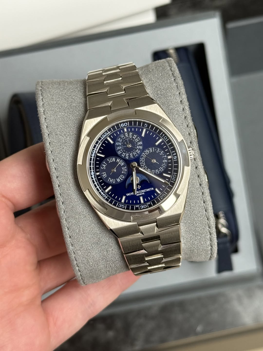 May be an image of wrist watch and text