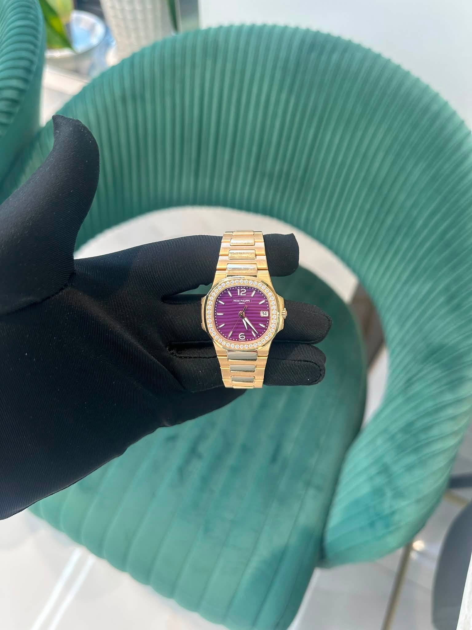 May be an image of wrist watch and text
