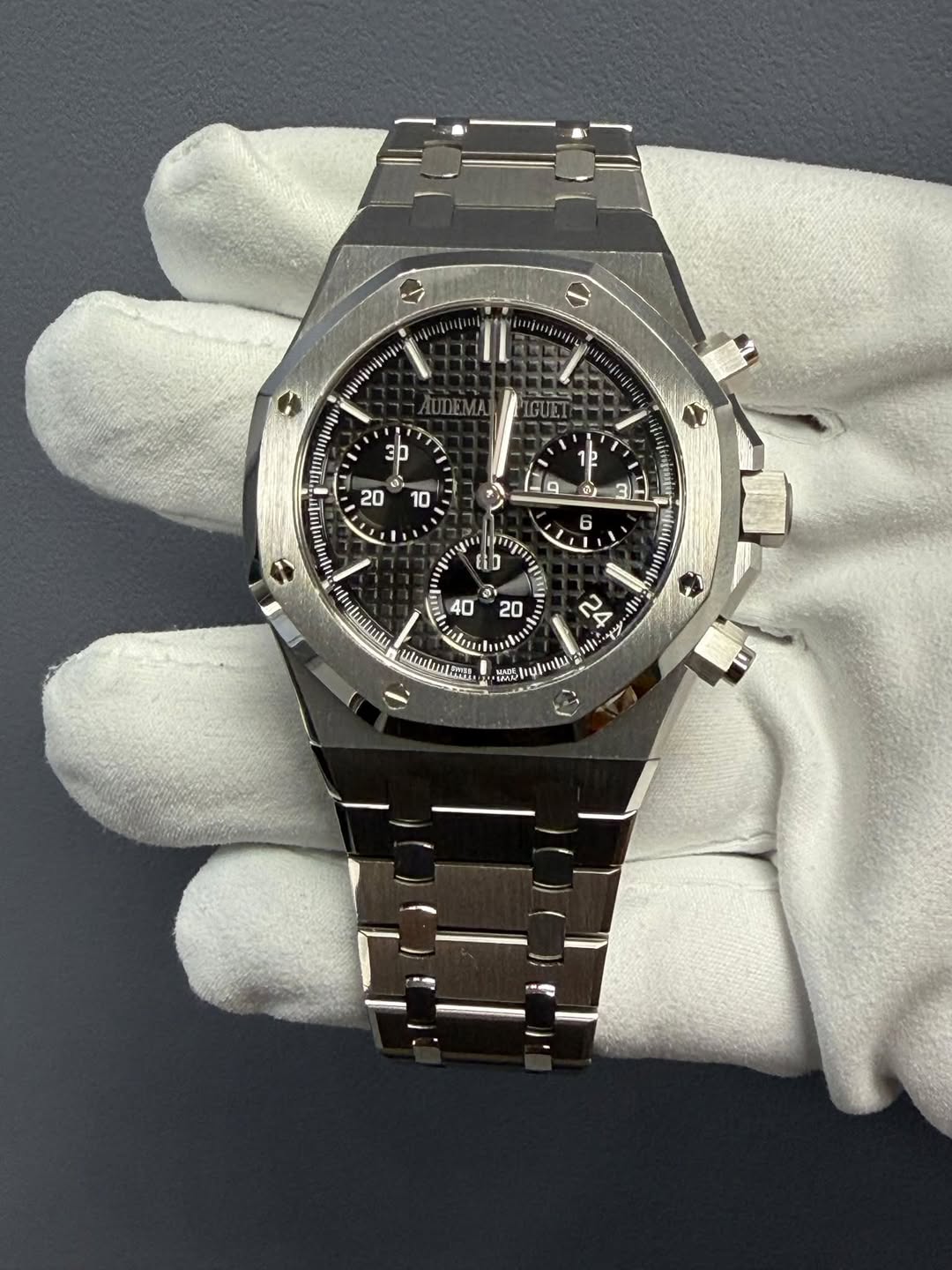 May be an image of wrist watch and text
