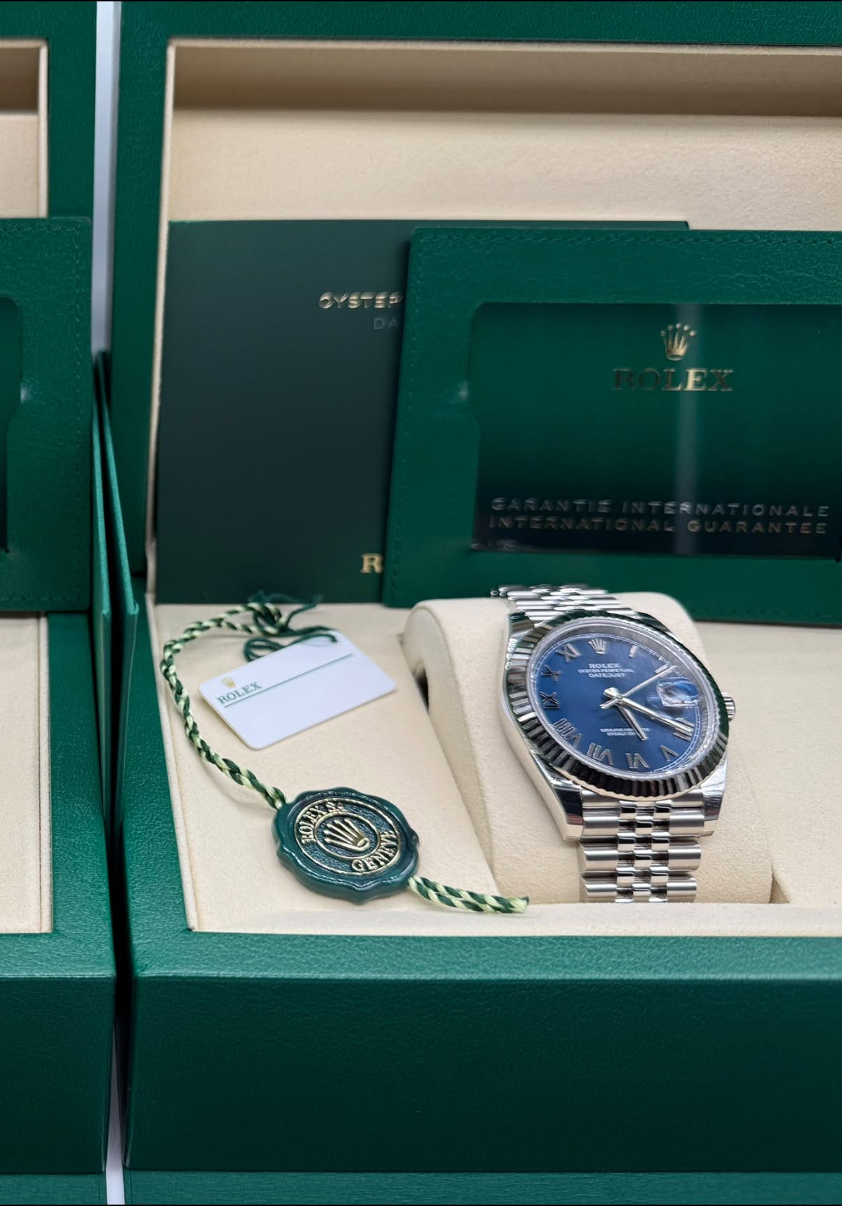 May be an image of wrist watch and text
