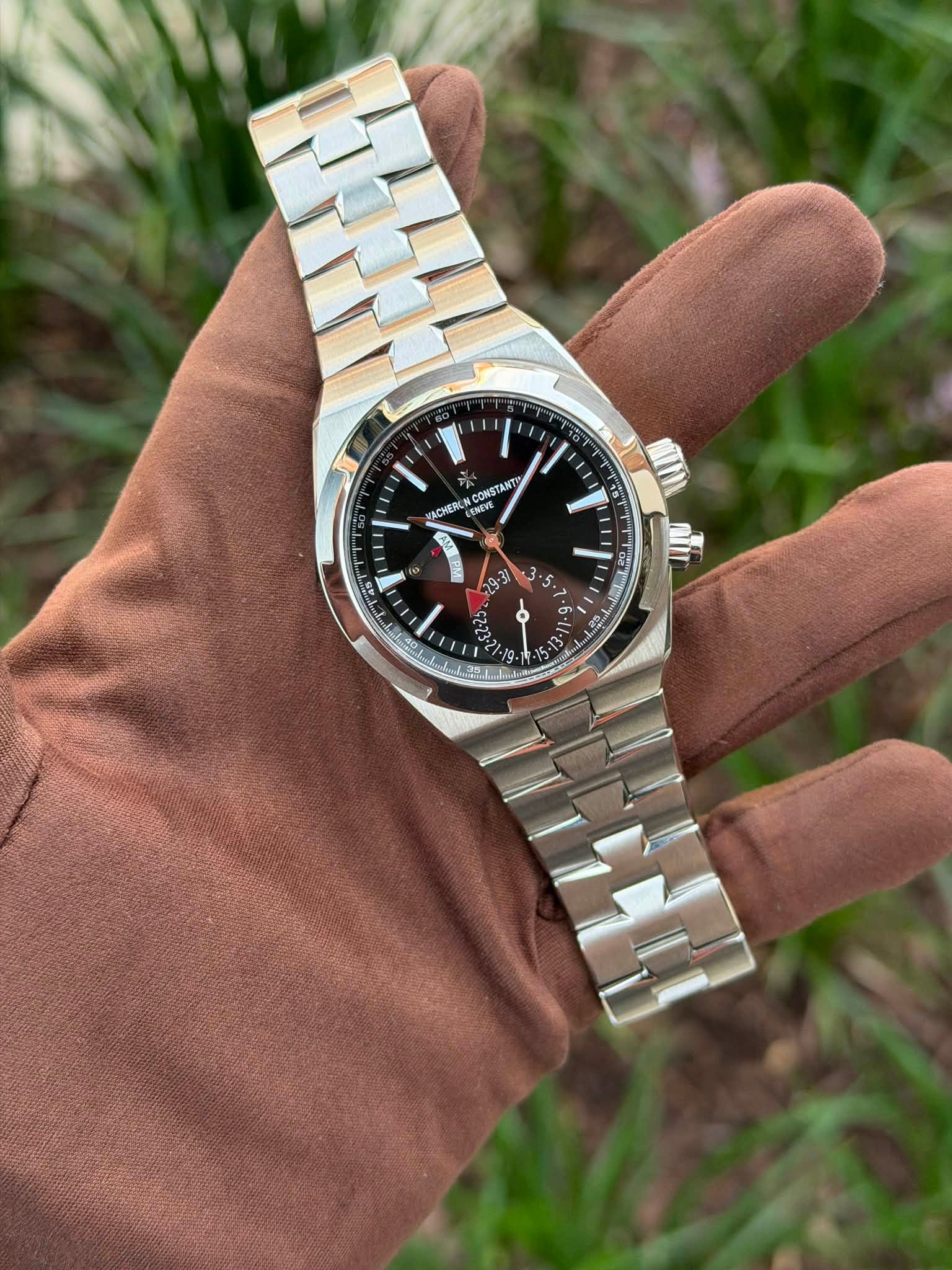 May be an image of wrist watch and text