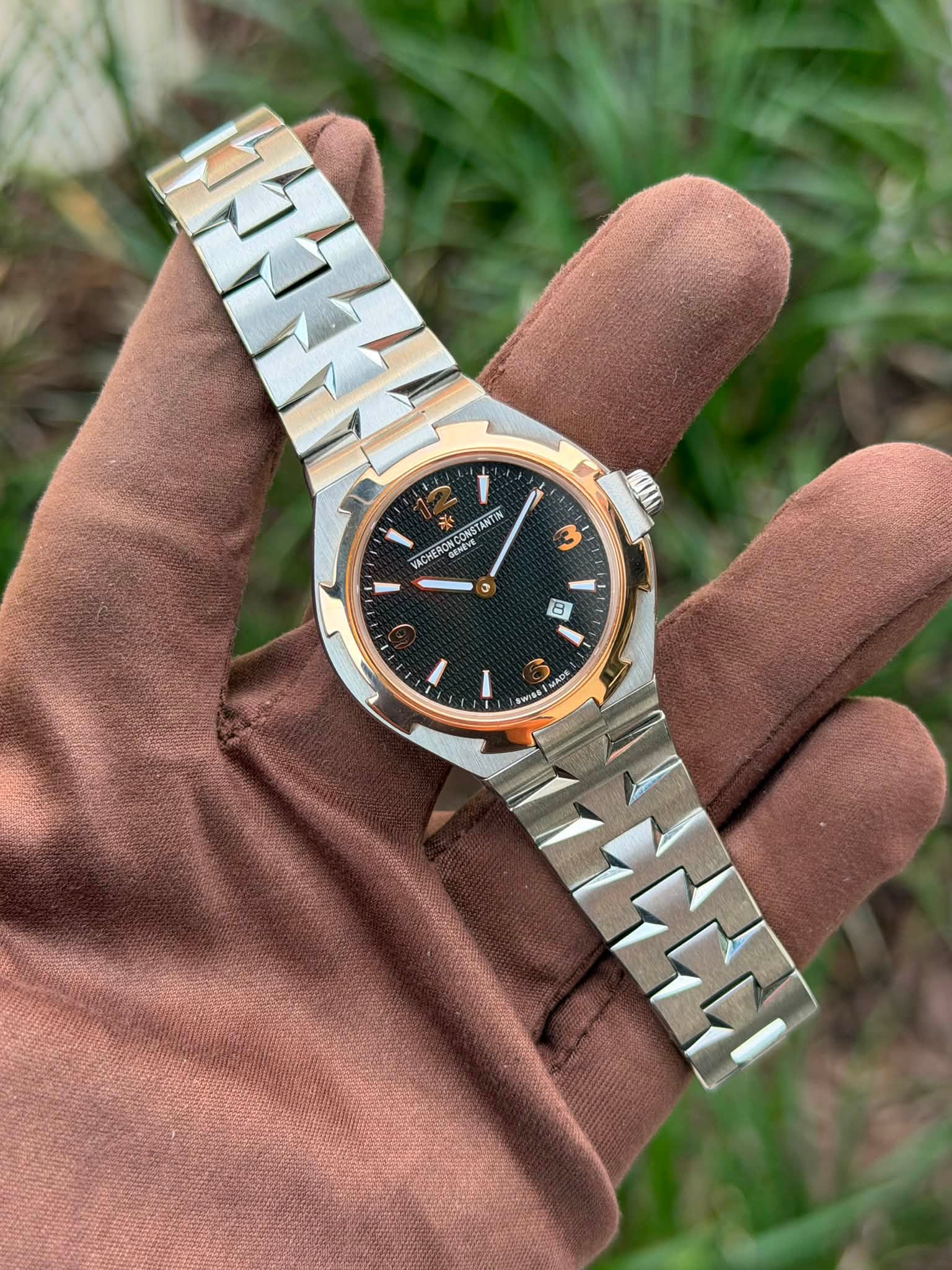 May be an image of wrist watch and text