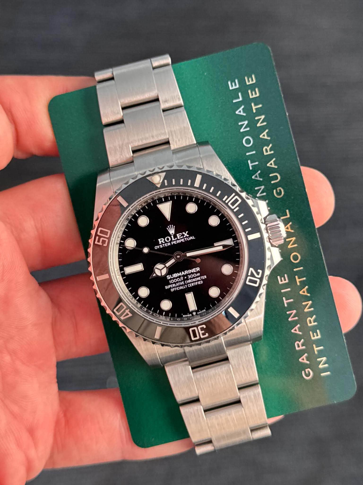 May be an image of wrist watch and text that says 'ና 50 OYSTER STERPERPETUAL OEлR ROLI ROLEX PERPETUAL TUAL 1000/ 1000f SUBMARINER ONOMETER TTR フン PURLATIMECHRONON ENTIRIED…