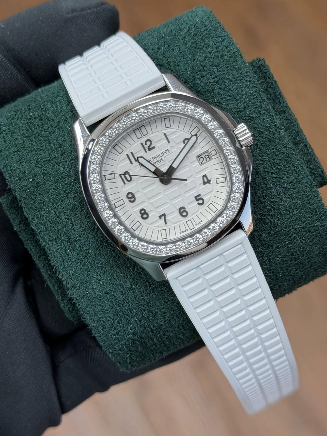 May be an image of wrist watch and text
