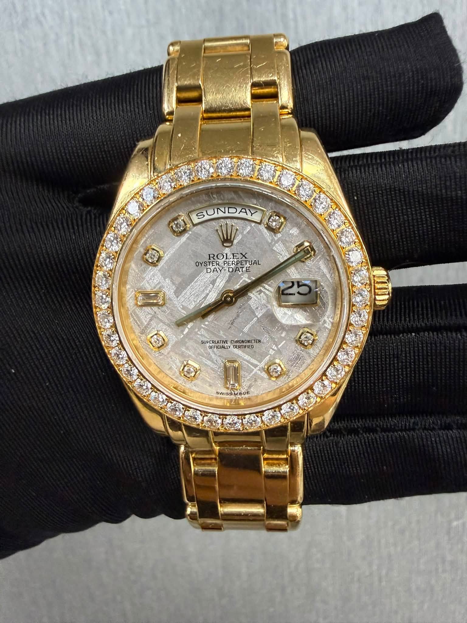 May be an image of wrist watch and text