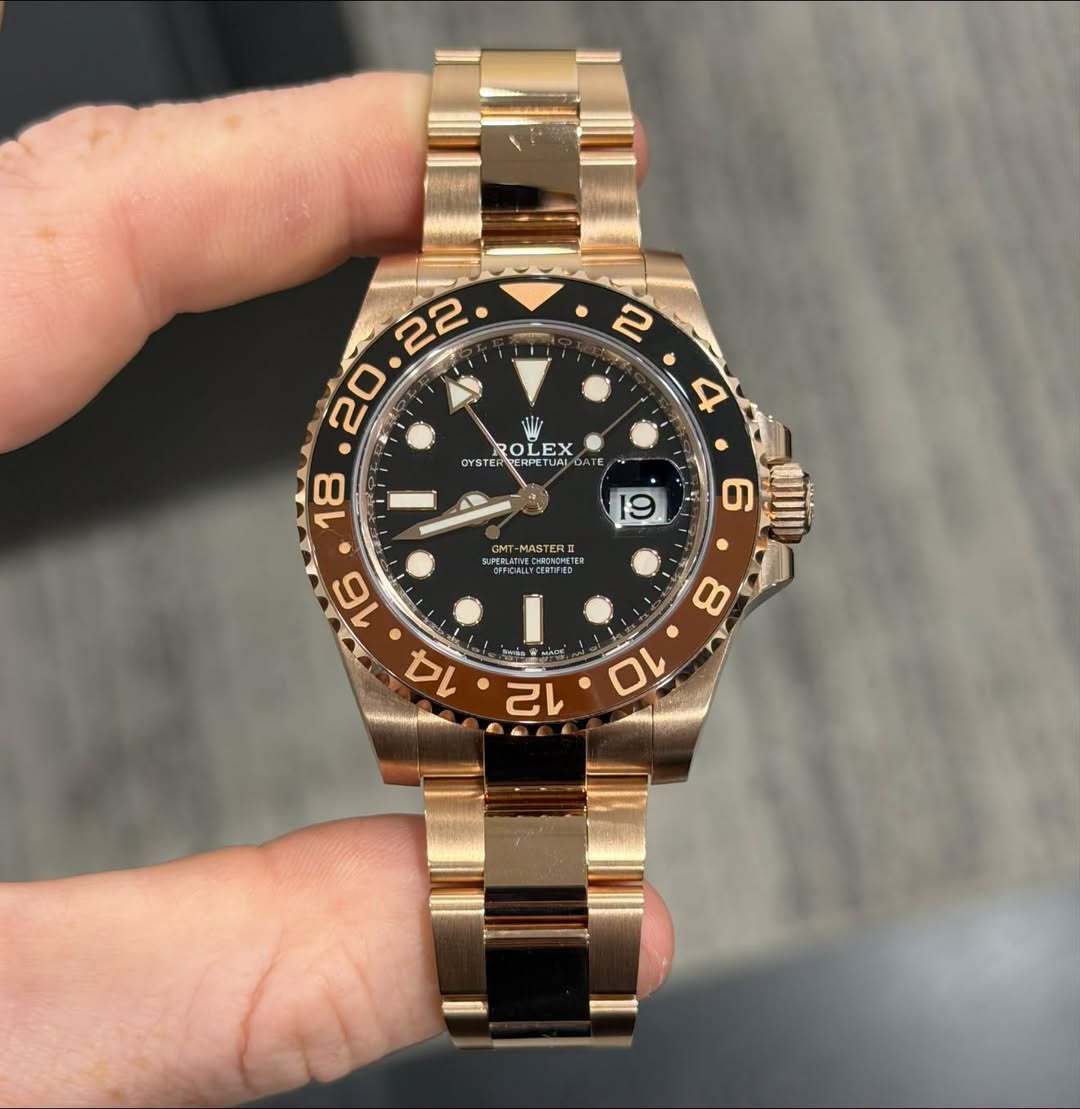 May be an image of wrist watch and text