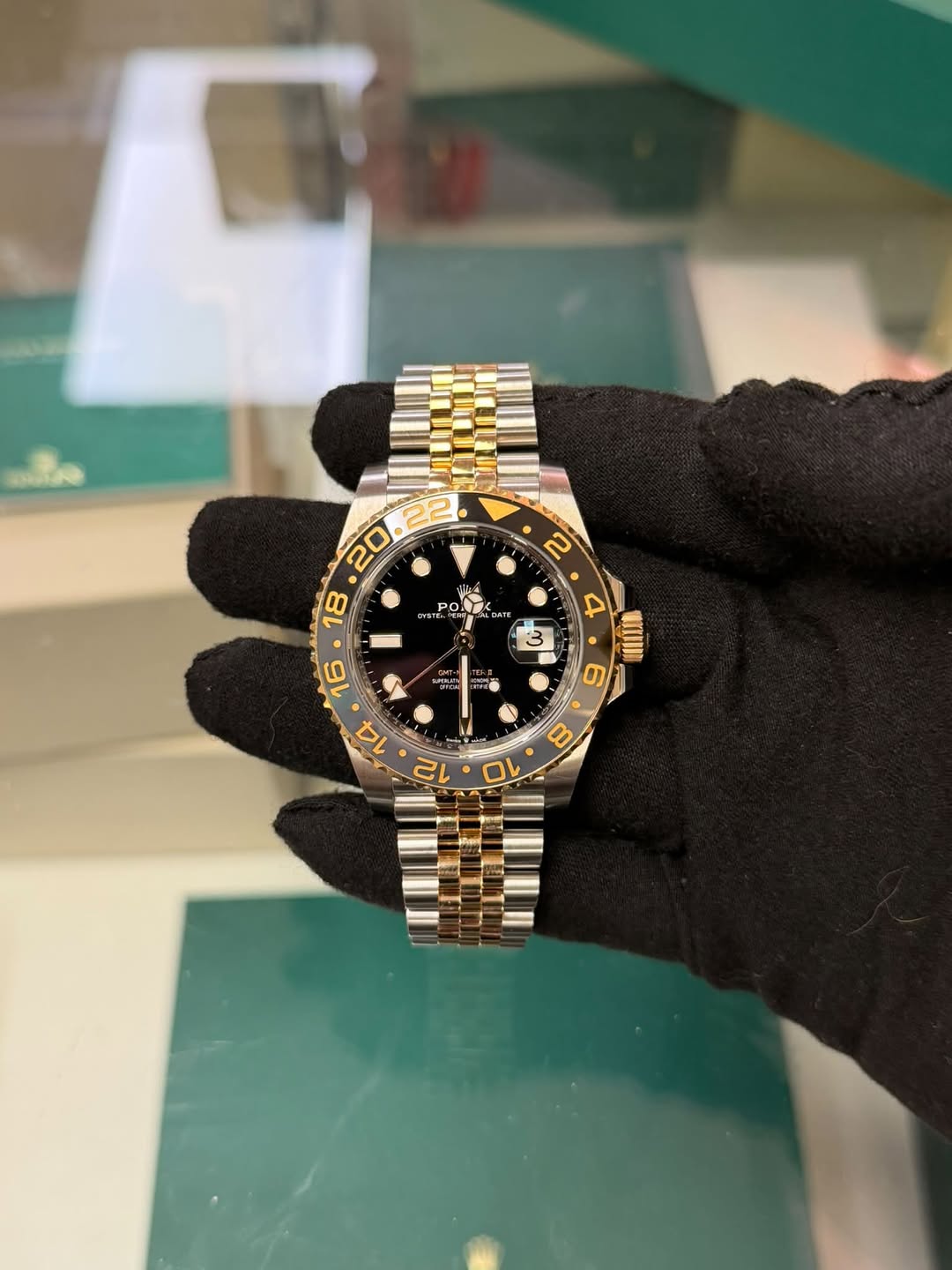 May be an image of wrist watch and text