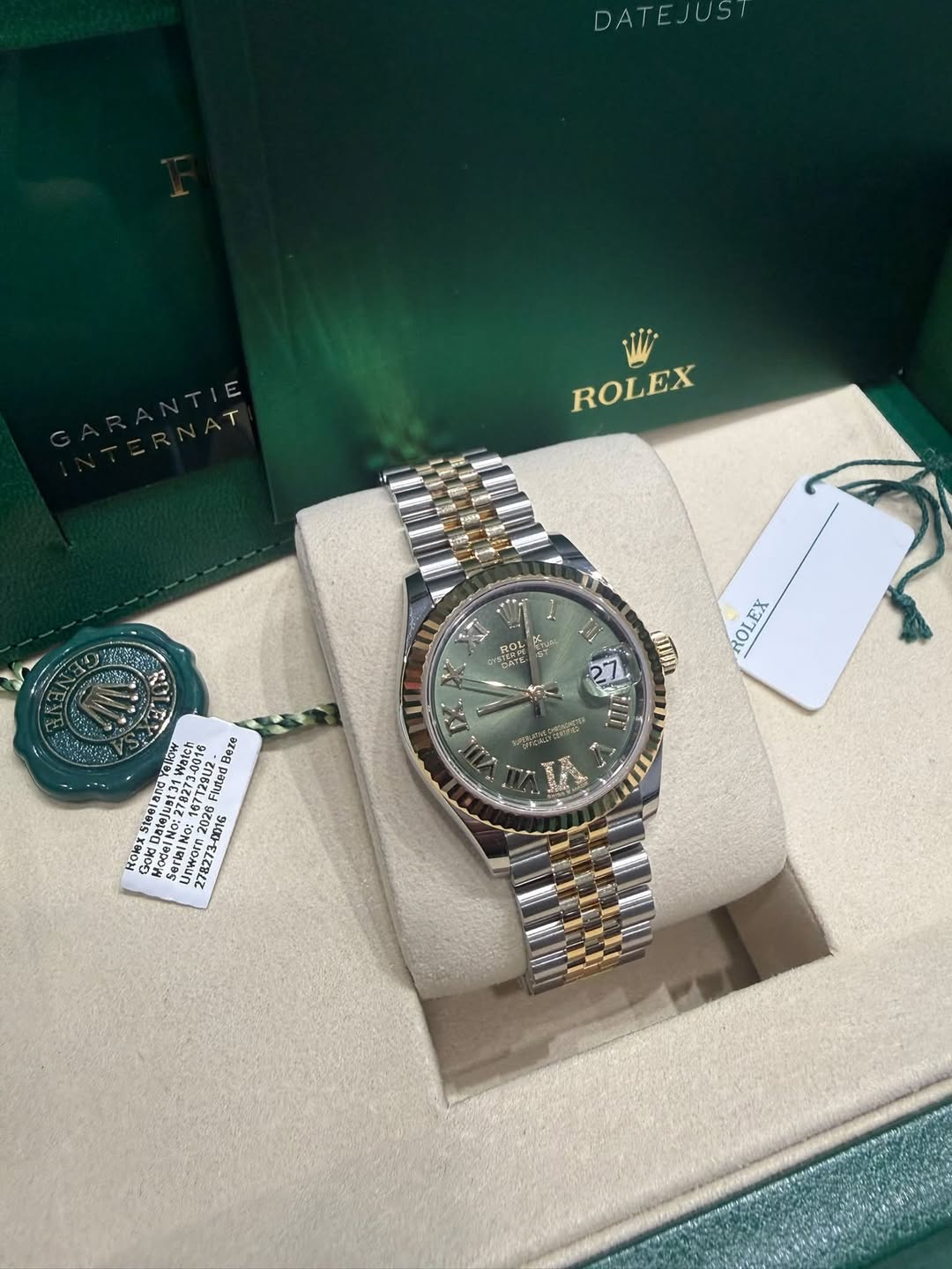 May be an image of wrist watch and text