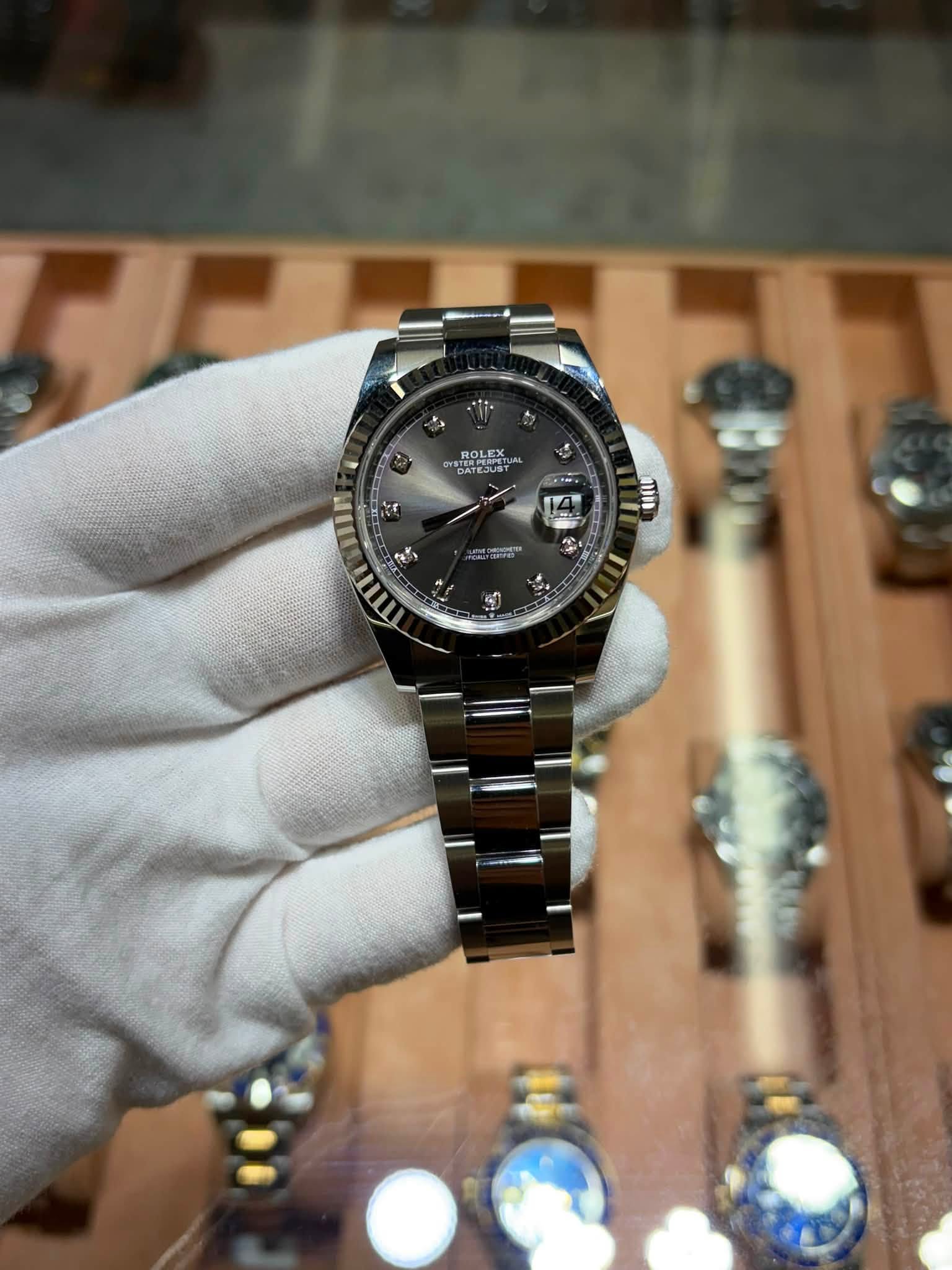May be an image of wrist watch and text