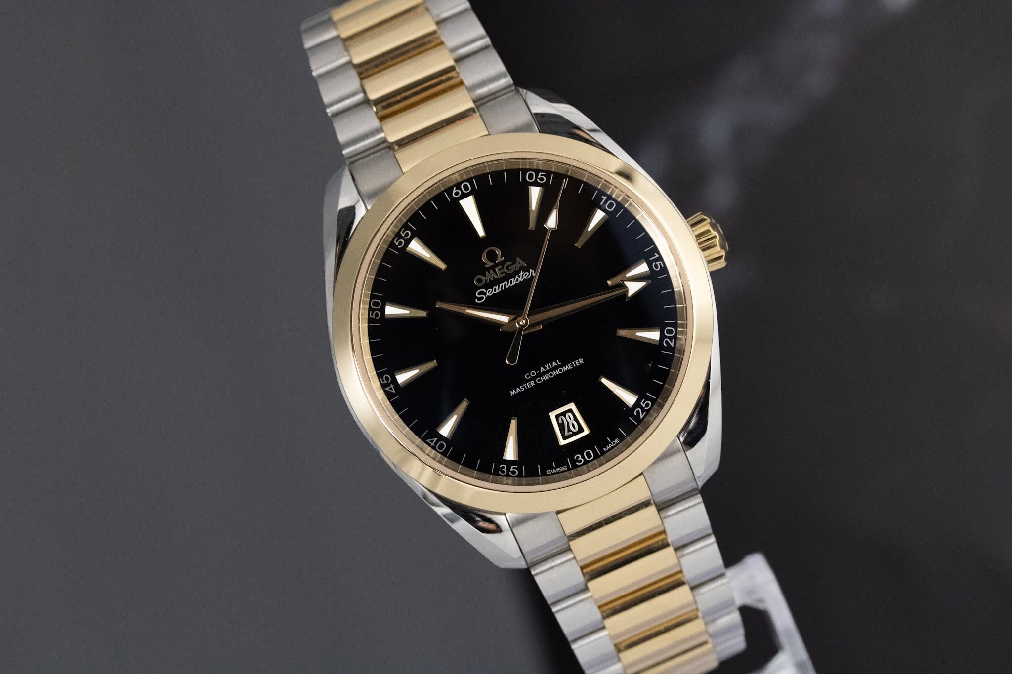 May be an image of wrist watch and text