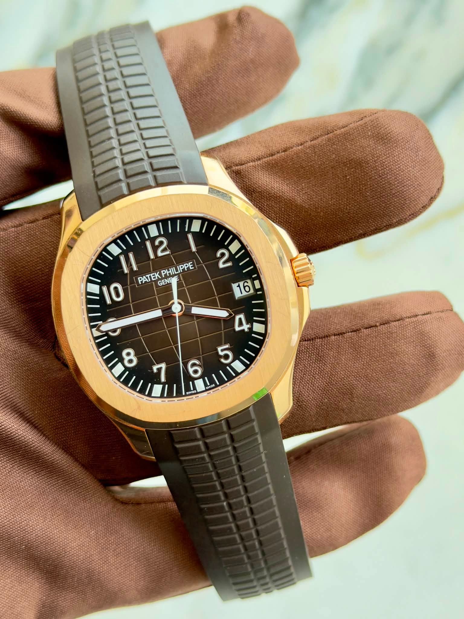 May be an image of wrist watch and text