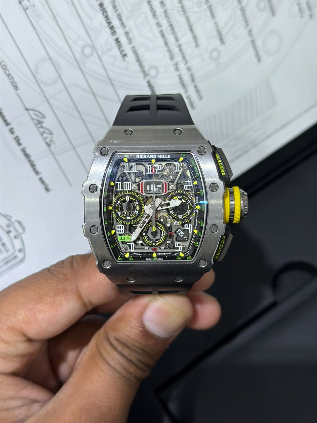 May be an image of wrist watch and text