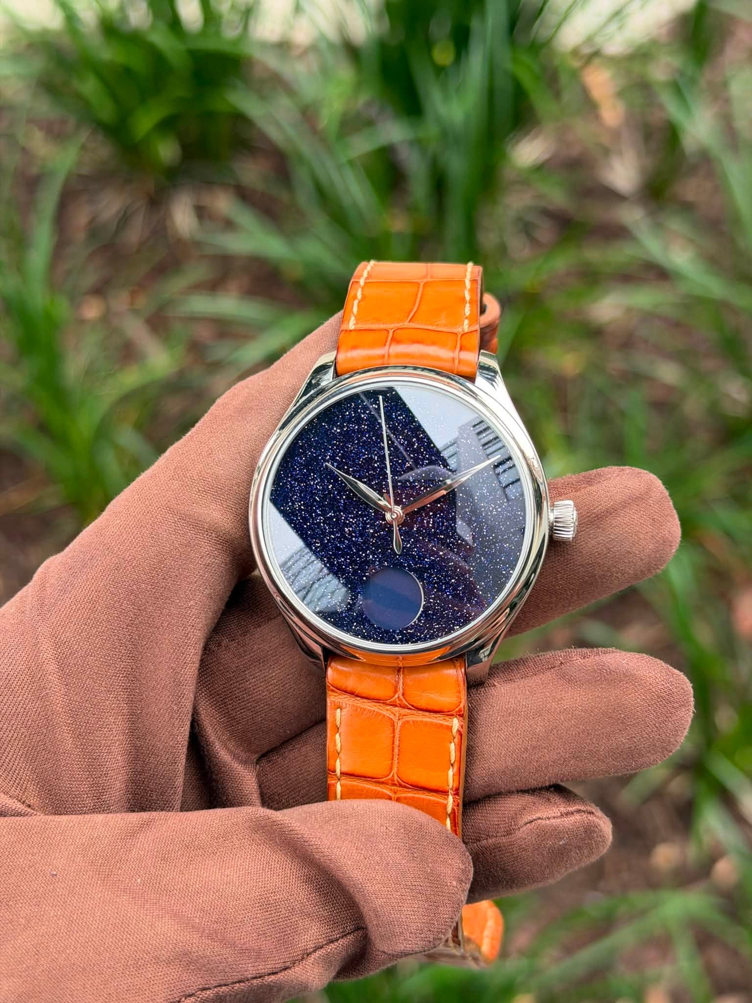 May be an image of wrist watch and text