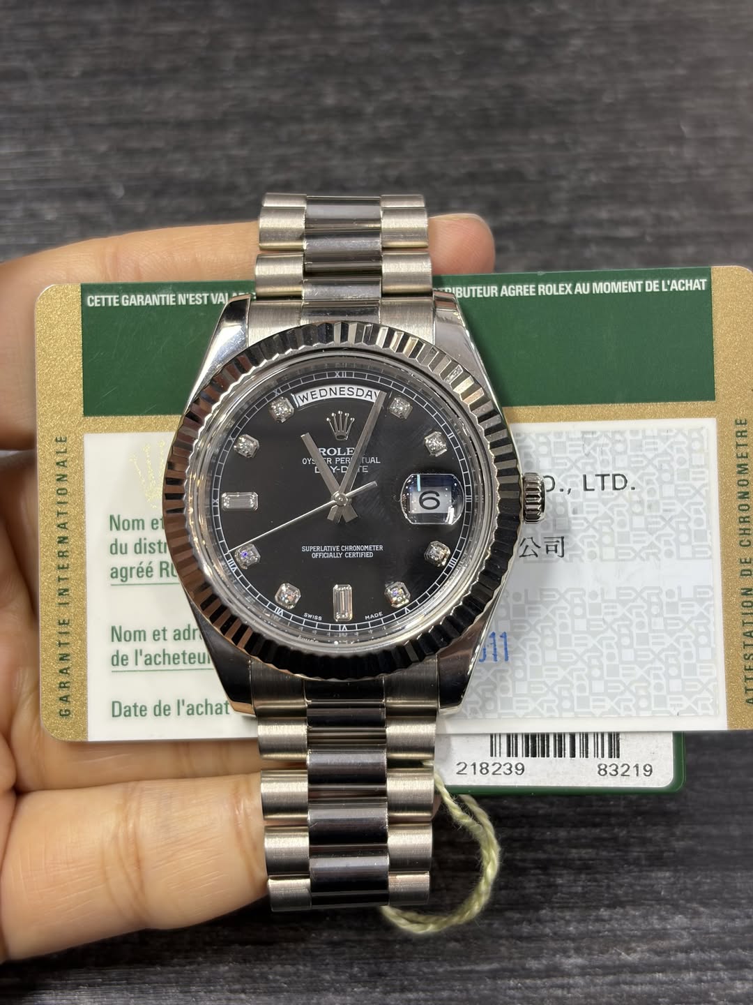 May be an image of wrist watch and text
