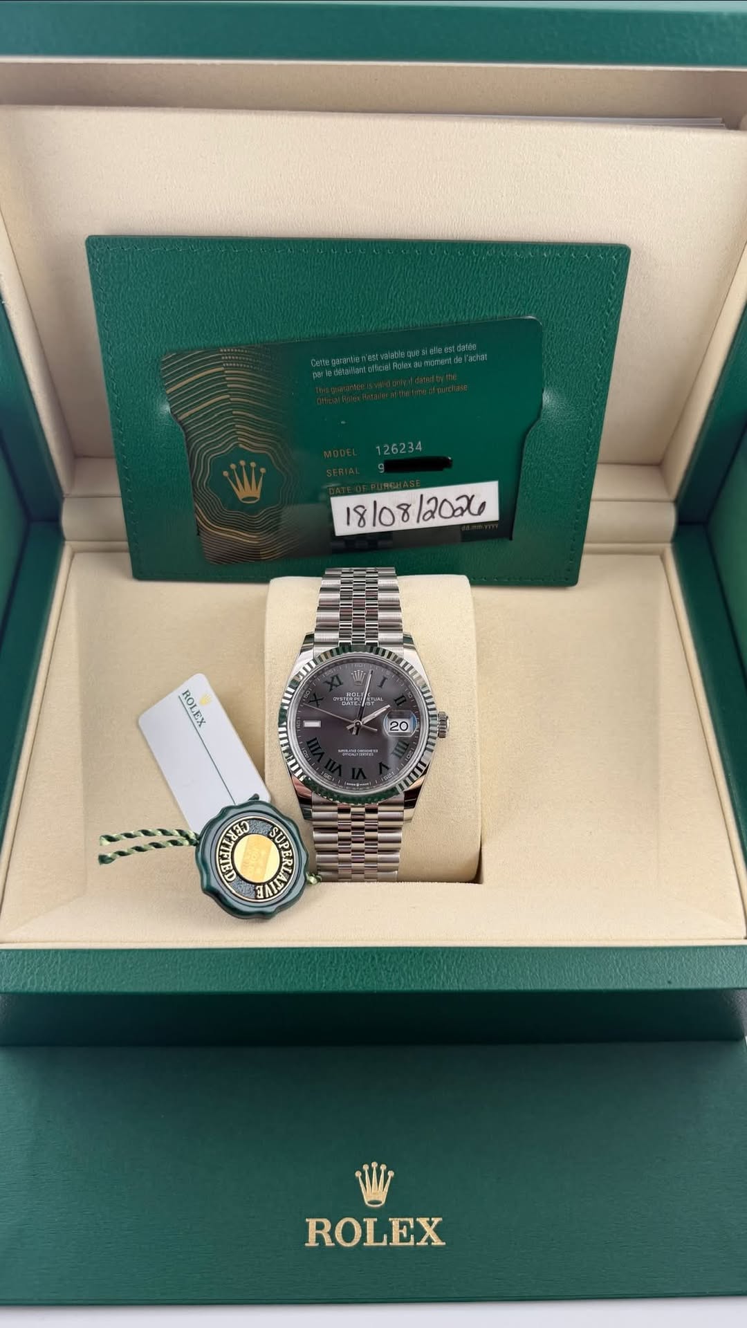 May be an image of wrist watch and text that says '26234 18/08/ /08 2026 עגי 주 ع ROLEX 20 그습이 10 MHT ECILY SUPE TALL ROLEX'