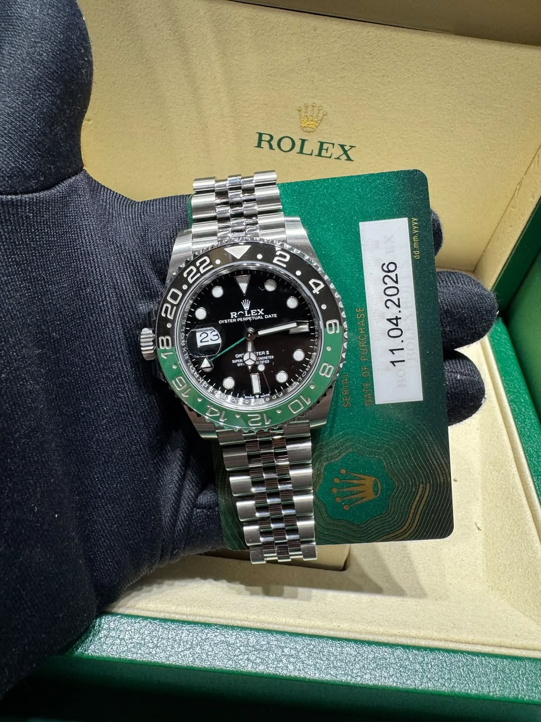 May be an image of wrist watch and text