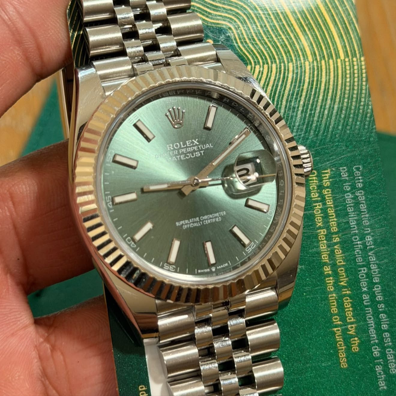 May be an image of wrist watch and text that says 'ROLEX PERPETUAL UAL ERPERPE ATEJUST 45 በስ a CHRCINOMETER SUPERLATIM かず広Aしし CERTIFIED 23 25 G 3 MADE SWIDS ት Official Rolex…