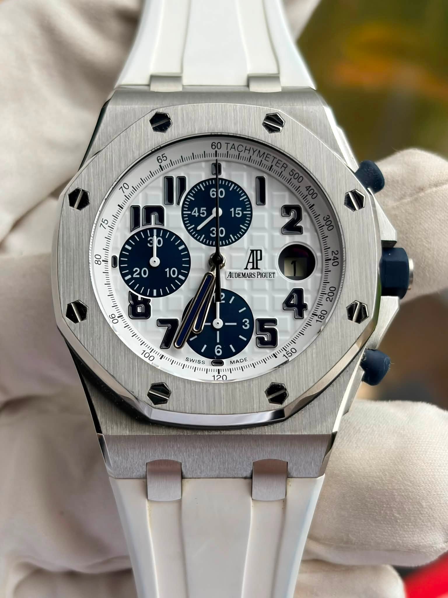 May be an image of wrist watch and text