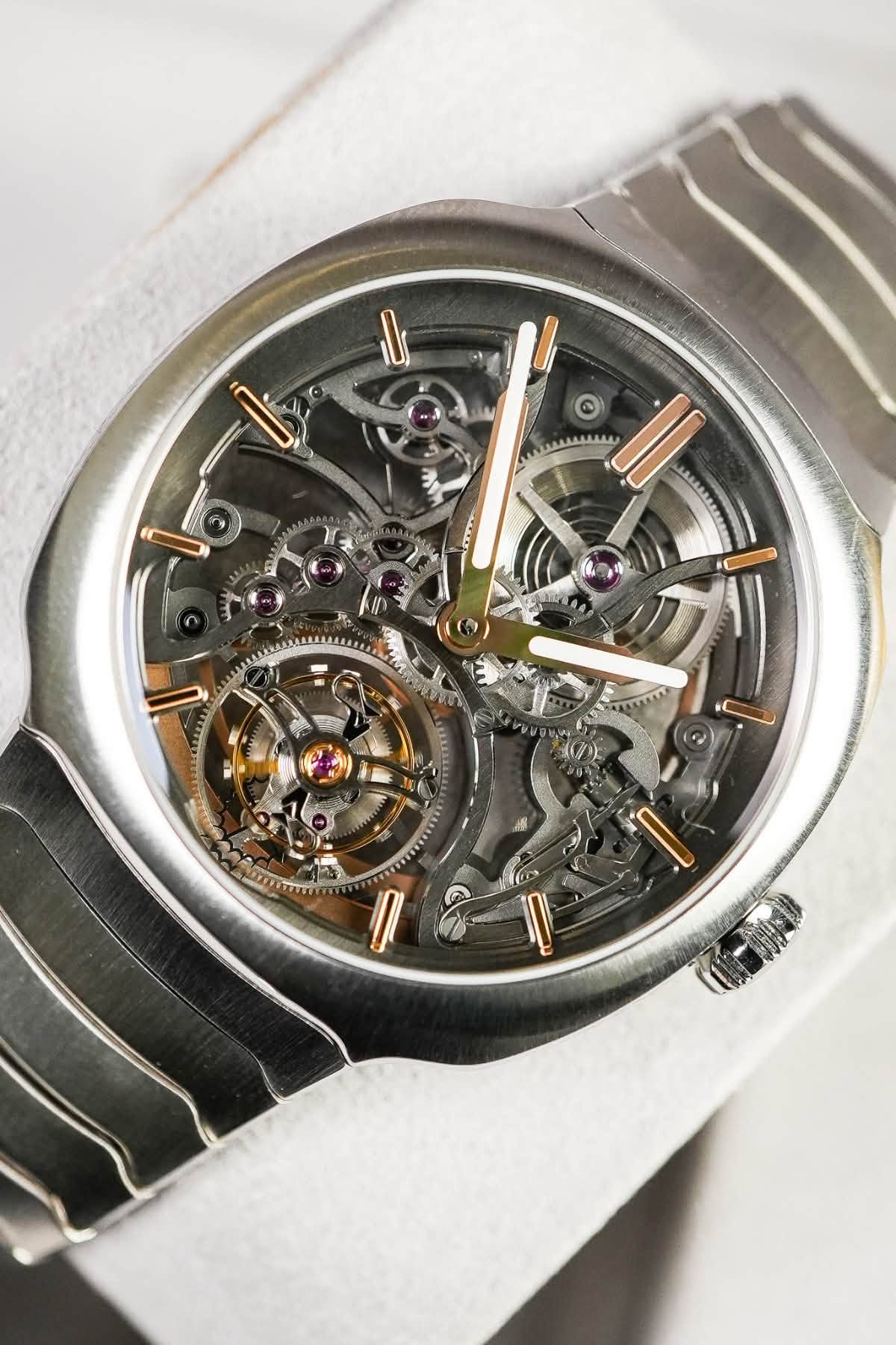 May be an image of wrist watch and text