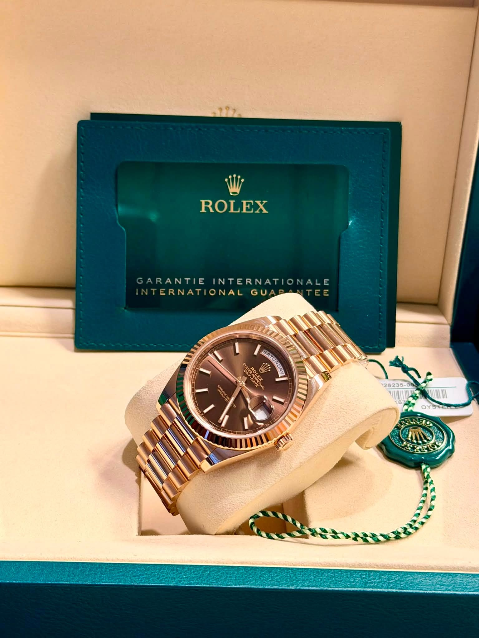 May be an image of wrist watch and text
