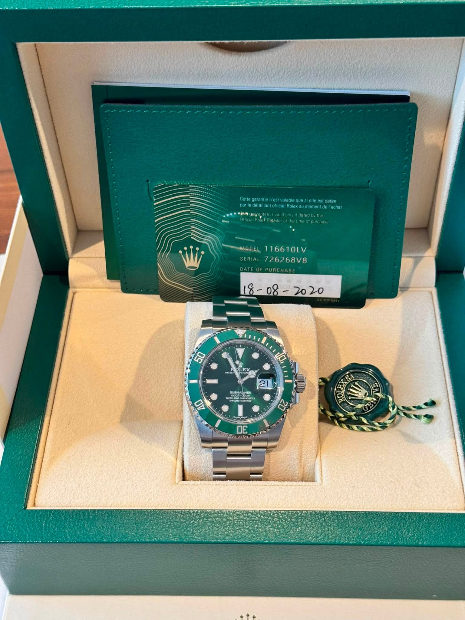 May be an image of wrist watch and text that says 'ทง 4BAL116610LV 116610LV 726268V8 τα, 21 新 =% 00 40 VOE 15'