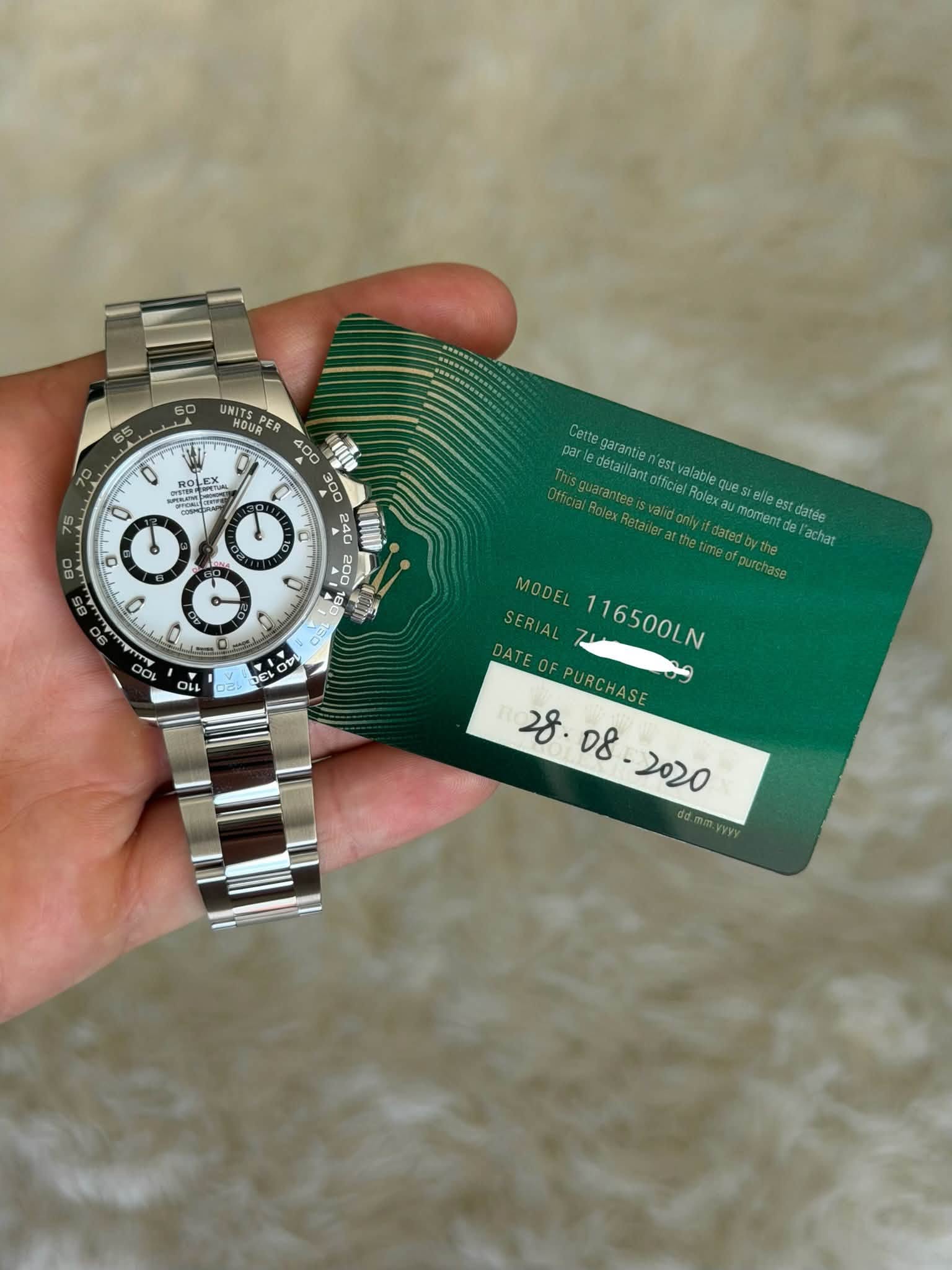 May be an image of money, wrist watch and text that says '60 65 UNITS NOUR MHOLE SNE ပင်ကန R- MEGOTA ROLEX MR e 6 C par Cettegarantie Cettega détailiant garantie est Ofticier…