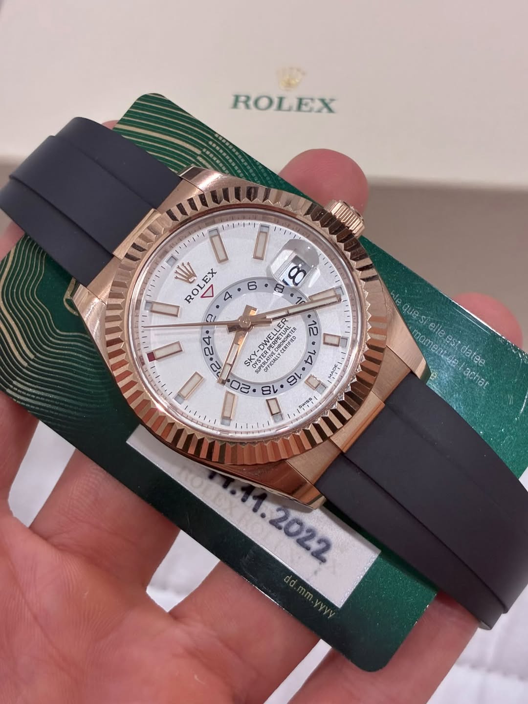 May be an image of wrist watch and text